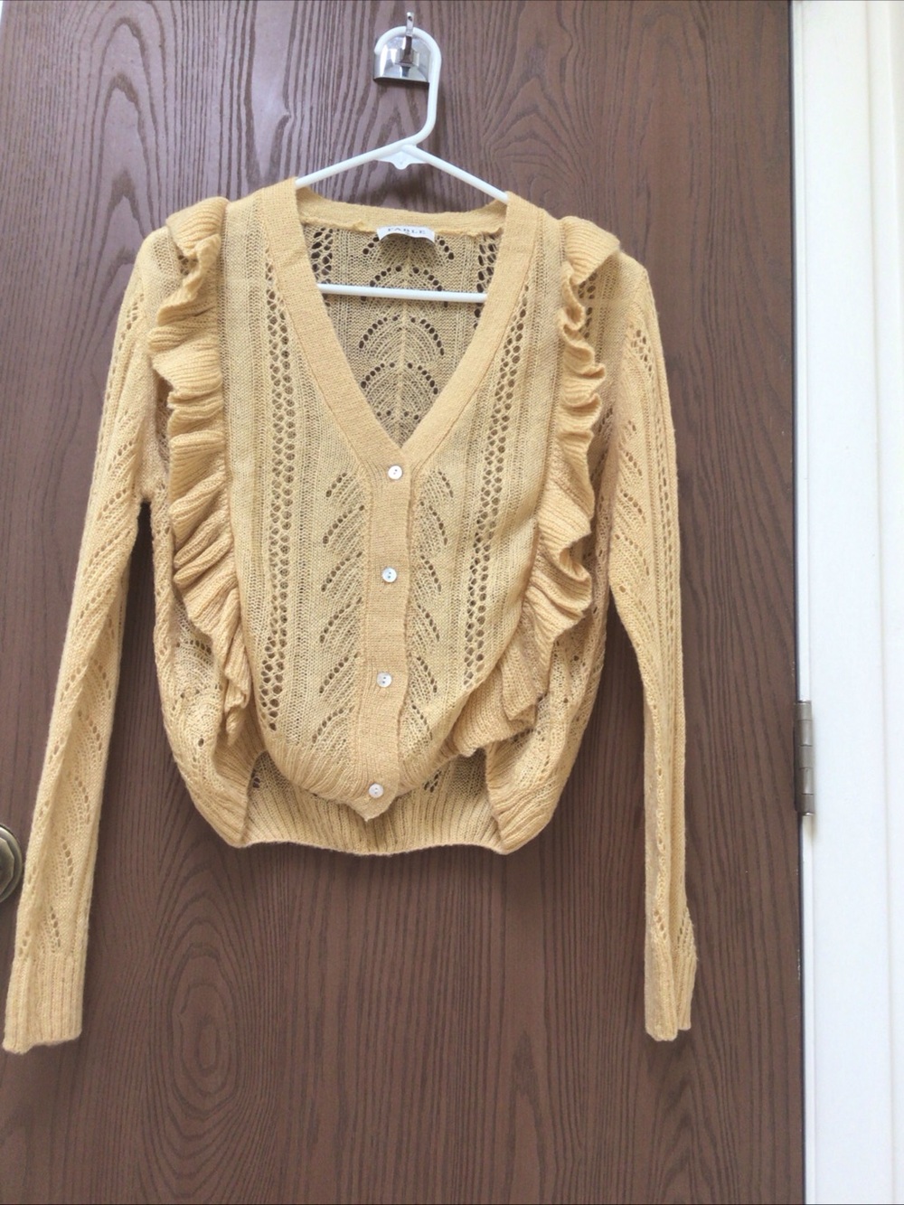 Anthropologie Ruffle Trim V‑Neck Cardigan in Mustard